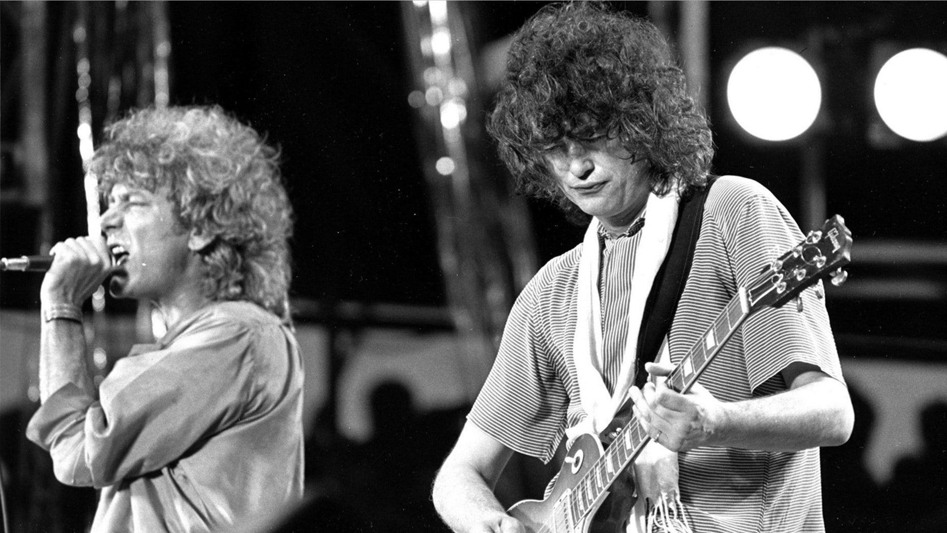 July 13, 1985: Singer Robert Plant, left, and guitarist Jimmy Page of the British rock band Led Zeppelin perform at the Live Aid concert at Philadelphia's J.F.K. Stadium.