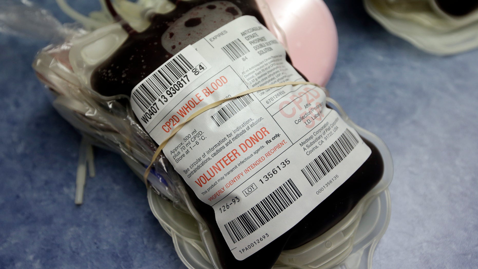 This Aug. 20, 2013 file photo shows blood donated in Indianapolis. On Friday, Aug. 26, 2016, the Food and Drug Administration recommended that all U.S. blood banks start screening for the Zika virus, a major expansion intended to protect the nation's blood supply from the mosquito-borne disease.