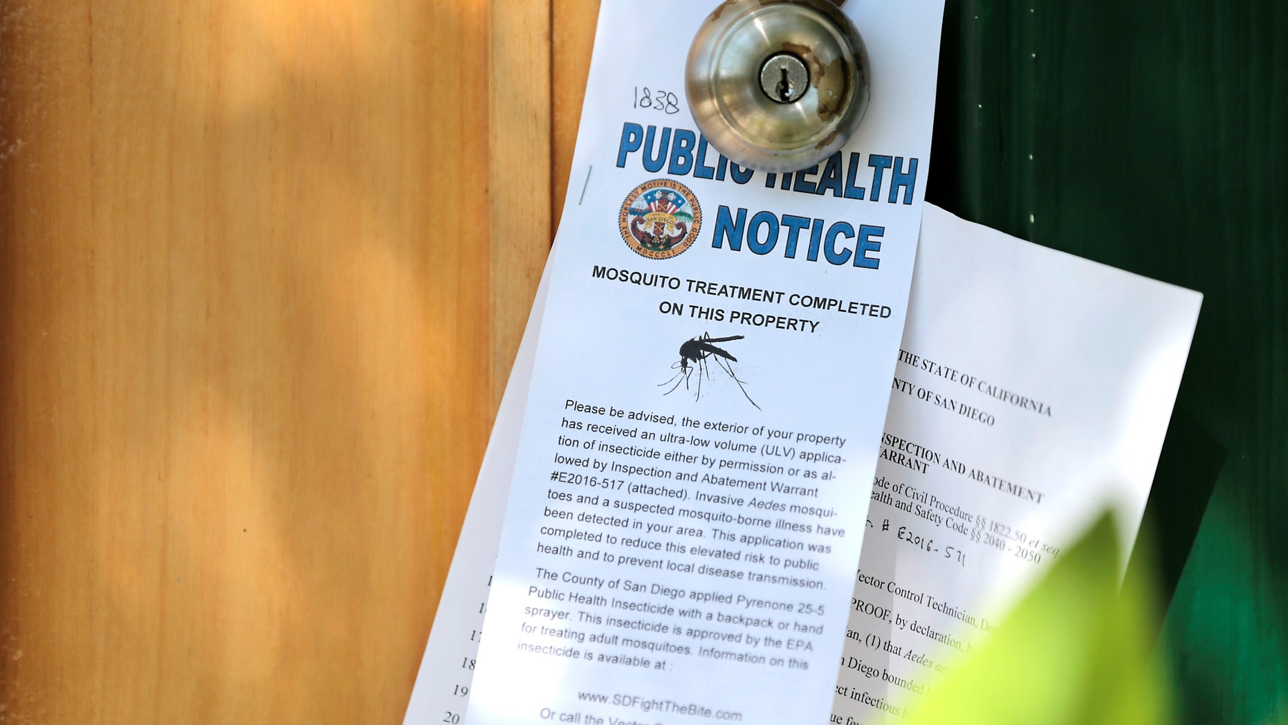 Notices given to homeowners as San Diego County officials hand spray a two block area to help prevent the mosquito-borne transmission of the Zika virus in San Diego, California, U.S. August 19, 2016.