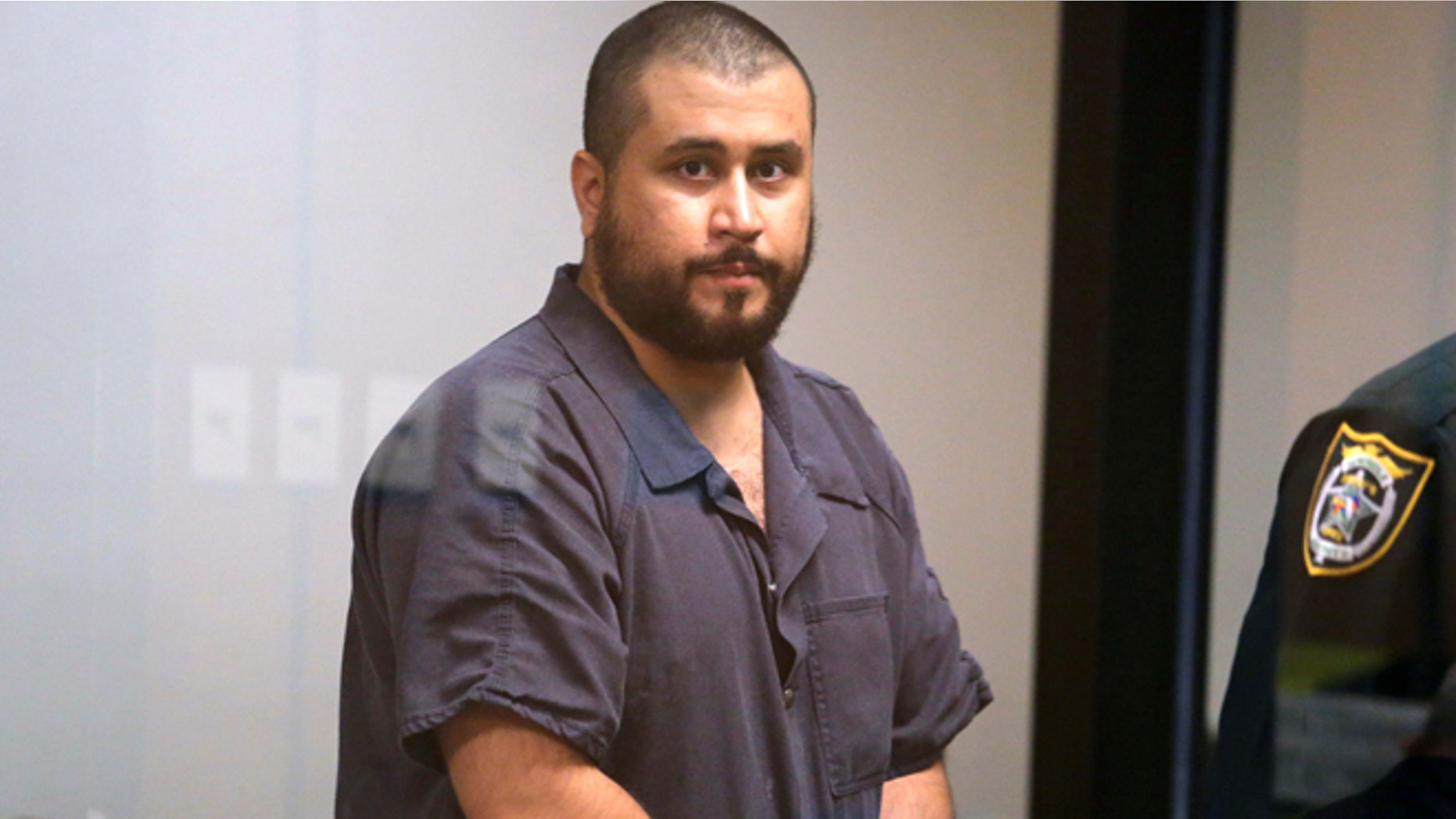 Nov. 19, 2013: George Zimmerman, the acquitted shooter in the death of Trayvon Martin, arrives in Courtroom J2 to face a Seminole circuit judge in Sanford, Florida.