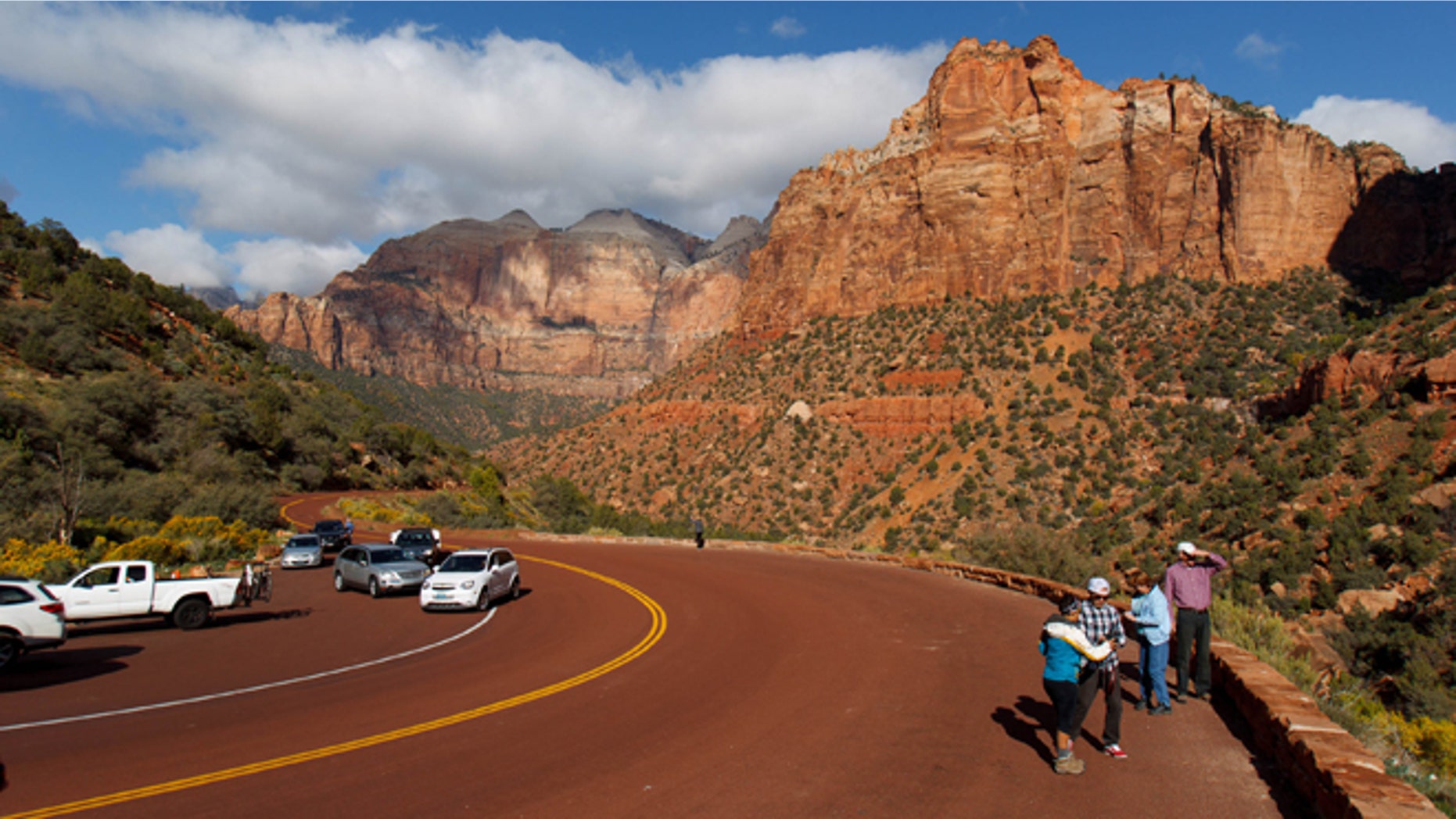 Oct. 11, 2013: Visitors to Zion National Park take in the sights after the park opened on a limited basis Friday near Springdale, Utah.