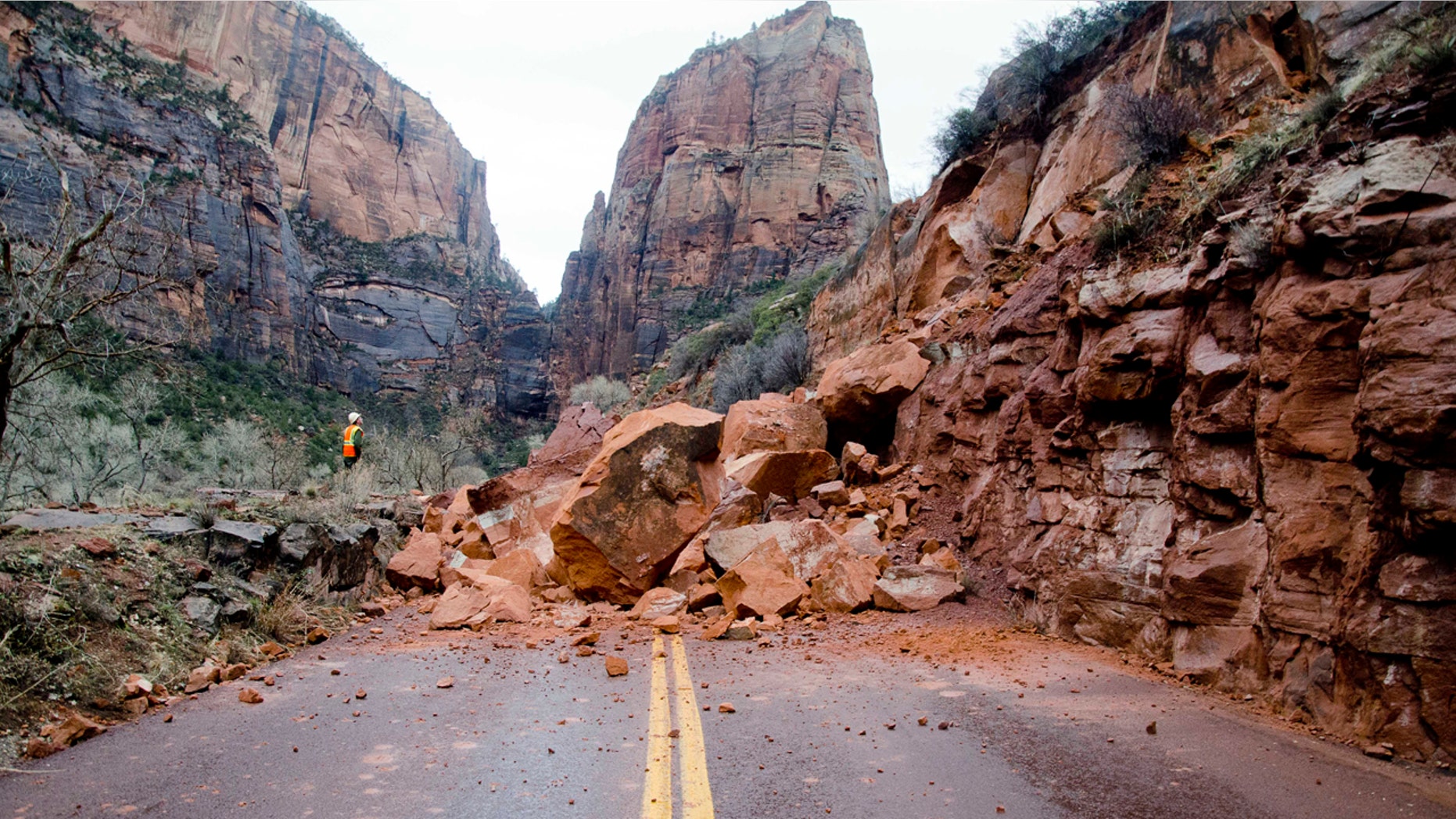In this Saturday, Jan. 14, 2017, photo released by the National Park Service shows the Zion Scenic Drive closed just north of the Zion Lodge at Zion National Park, Utah.