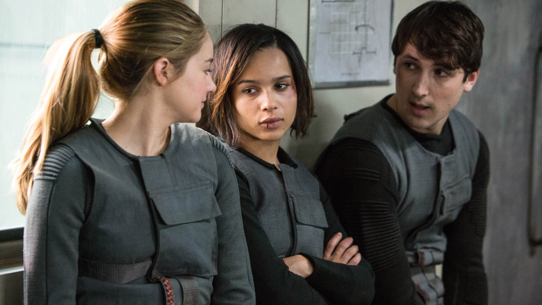 Shailene Woodley, Zoe Kravitz, and Ben Lloyd-Hughes in a scene from "Divergent."