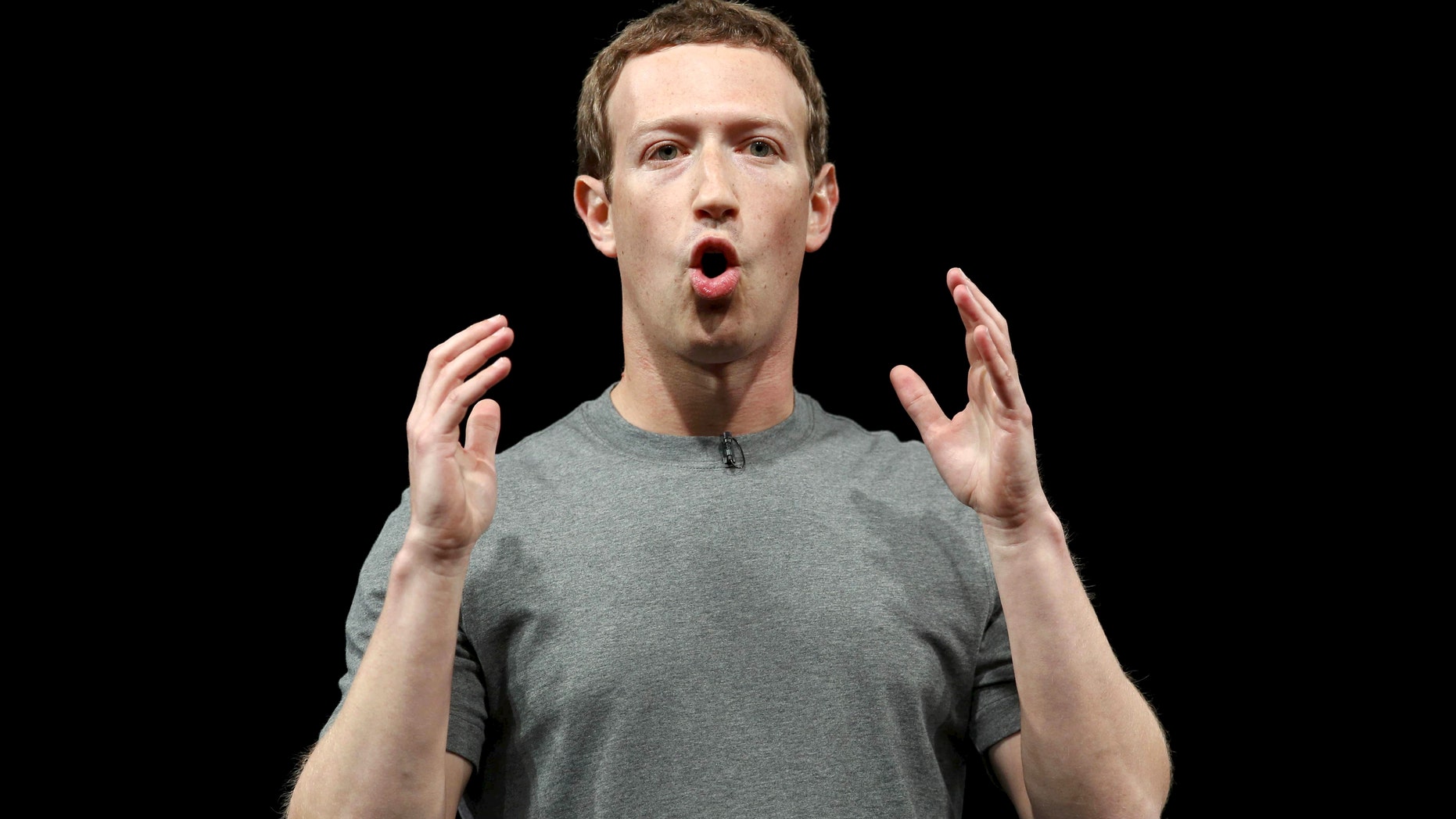 Mark Zuckerberg, founder of Facebook, speaks as he attends the unveiling ceremony of the new Samsung S7 and S7 edge smarthphones at the Mobile World Congress in Barcelona, Spain, Feb. 21, 2016. (REUTERS/Albert Gea)