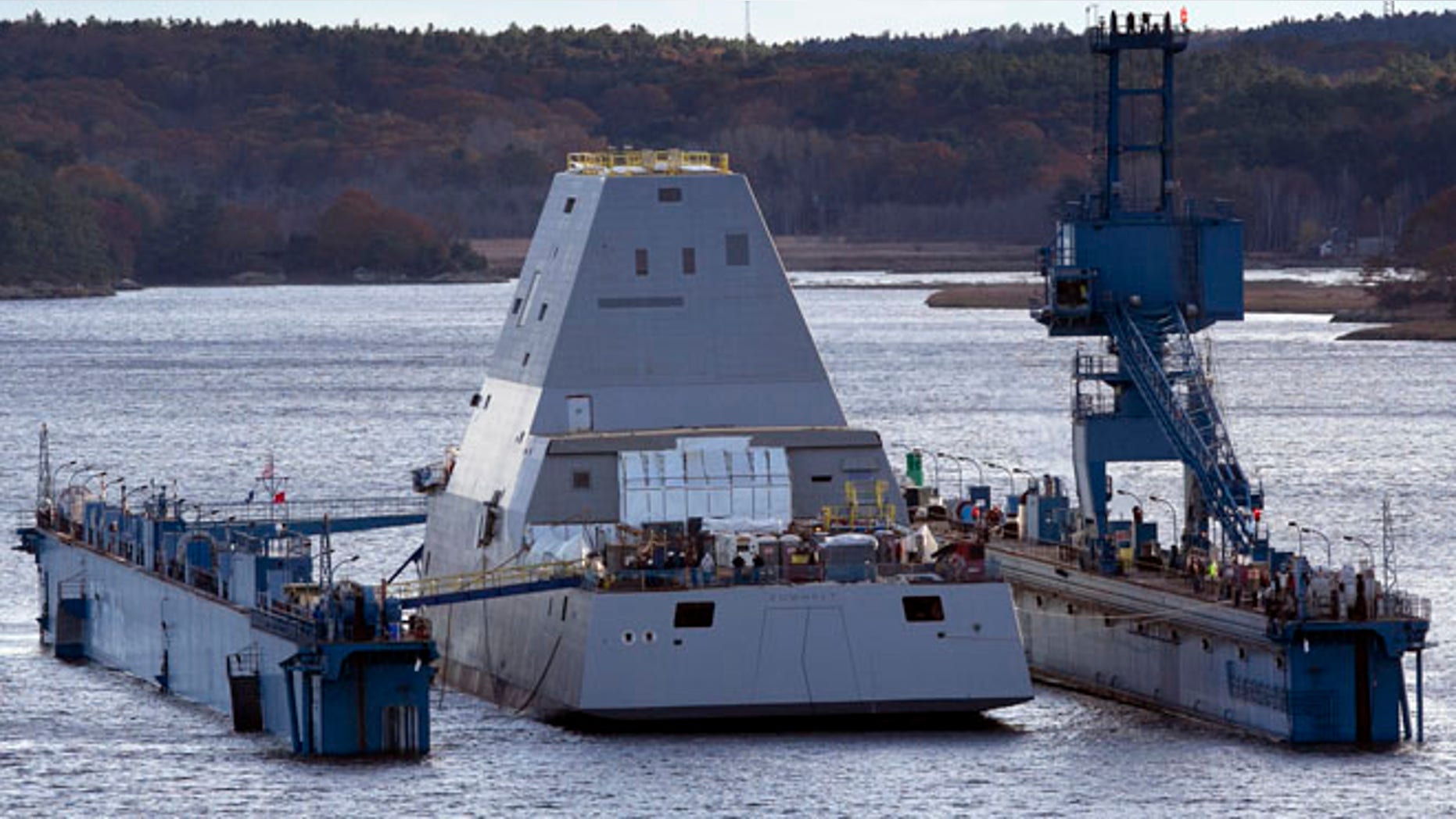 Oct. 28, 2013: The first-in-class Zumwalt, the largest U.S. Navy destroyer ever built, floats off a submerged dry dock in the Kennebec River, in Bath, Maine.
