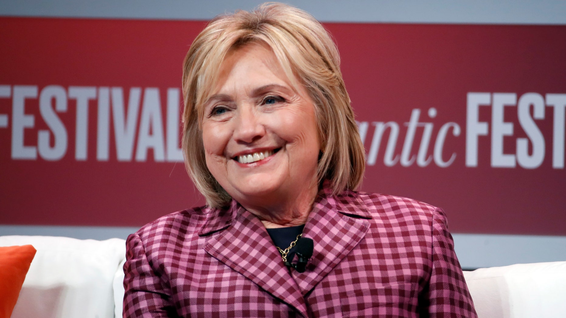 .FILE - Hillary Clinton talks with Jeffrey Goldberg, editor in chief of The Atlantic, during The Atlantic Festival, in Washington.
