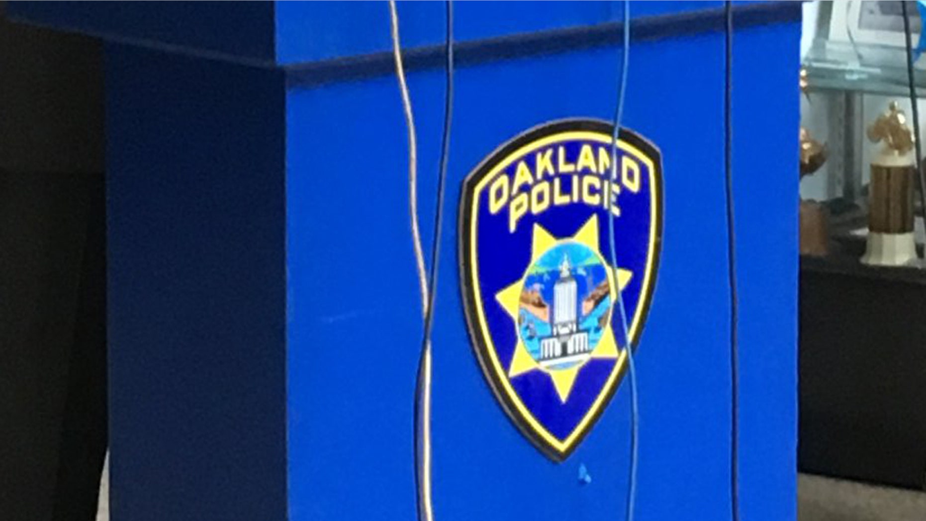 A body was found across the street from the Oakland Police Department on Tuesday.