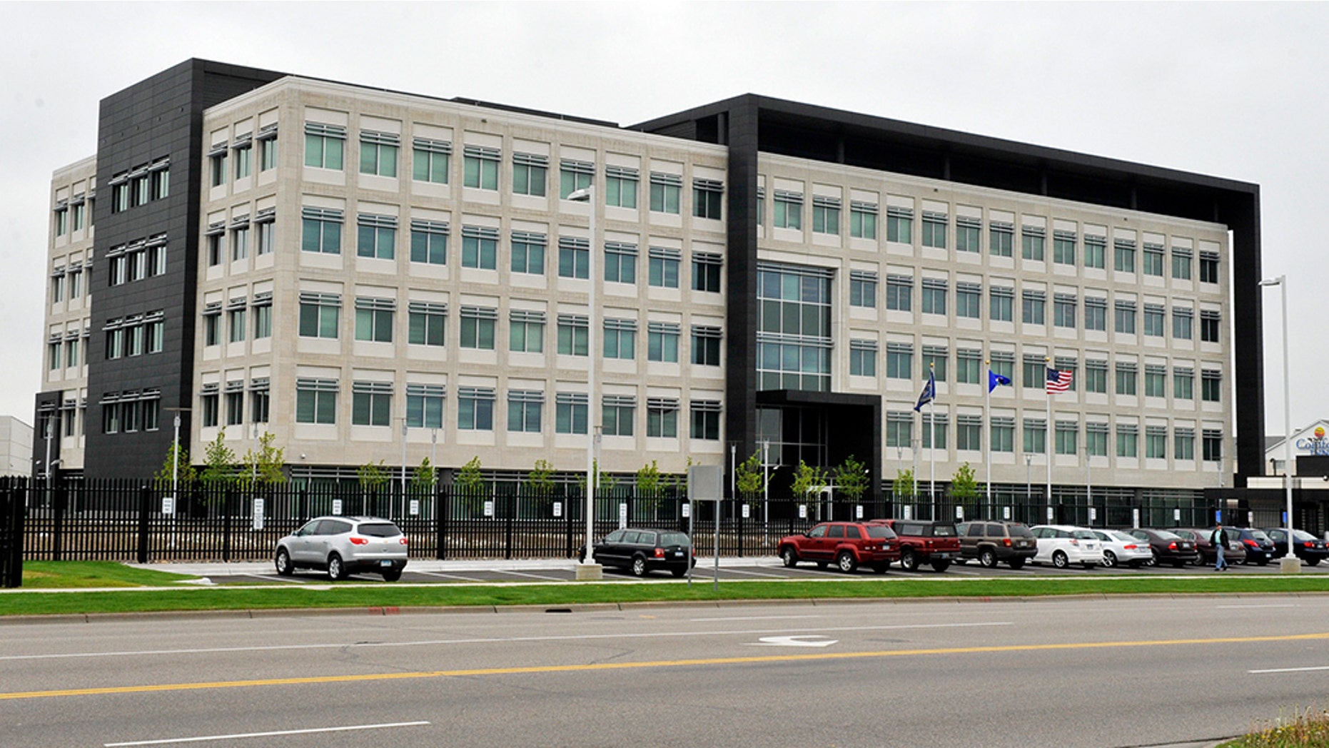 A Minnesota judge on Thursday sentenced a former FBI agent to four years behind bars after the man confessed to providing classified defense documents to a news organization.