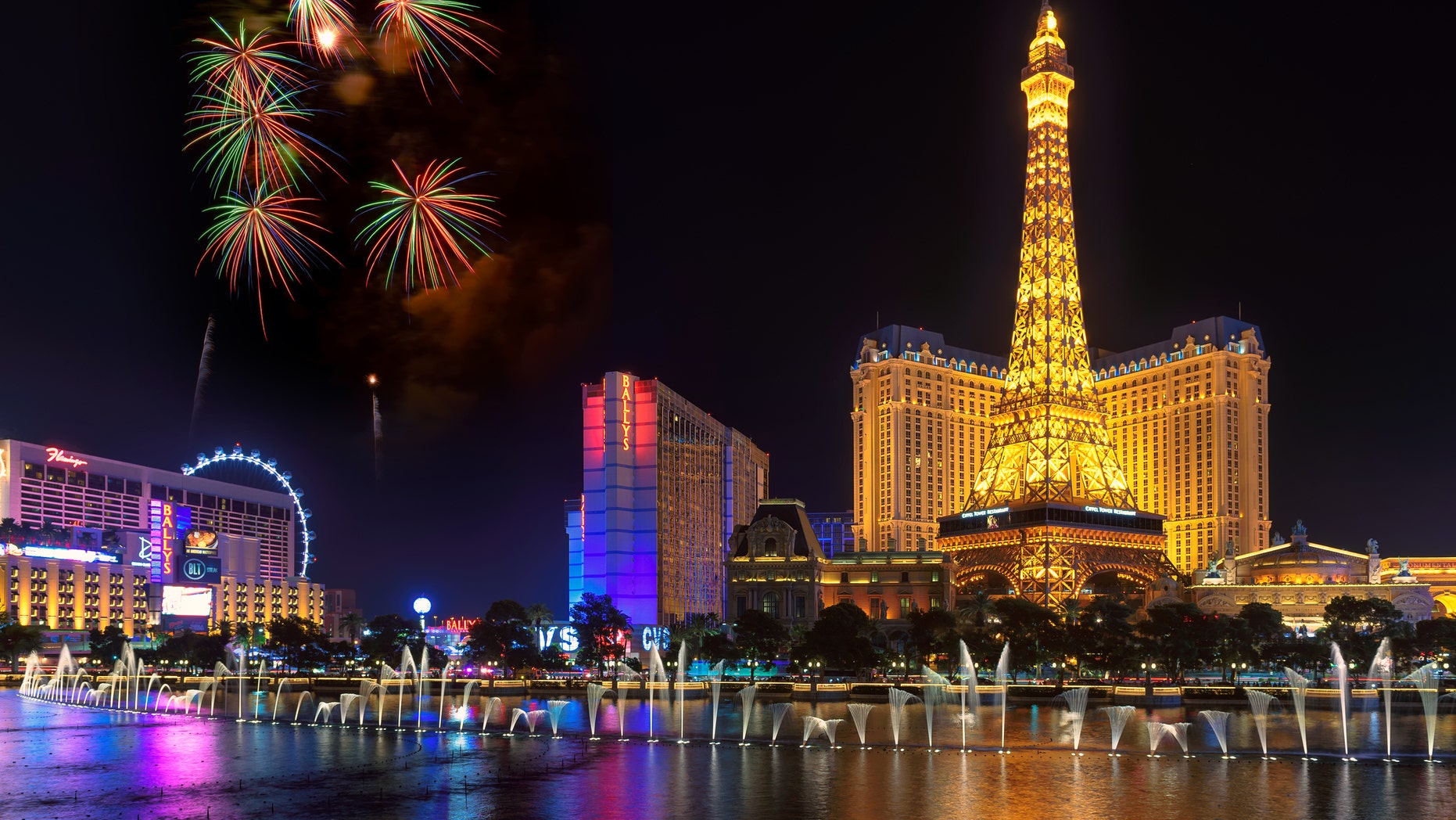 Las Vegas, Nevada - July 4, 2016: Fireworks at Bellagio Fountains in front of Paris Las Vegas hotel and casino and a replica of the Eiffel Tower in Las Vegas