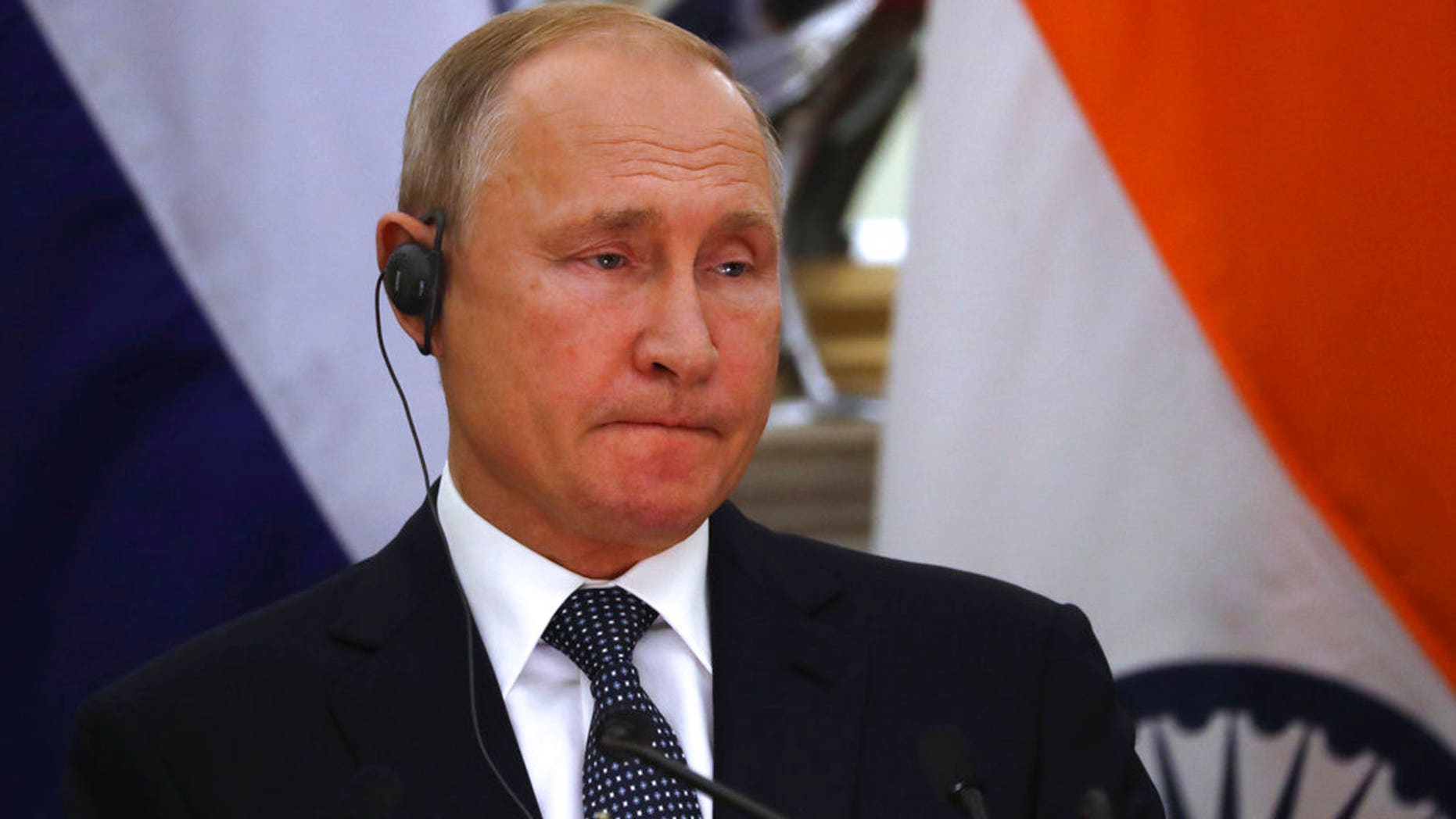Russian President Vladimir Putin speaks after a signing of agreements in New Delhi, India, Friday, Oct. 5; Putin wants to make Libya "his new Syria"