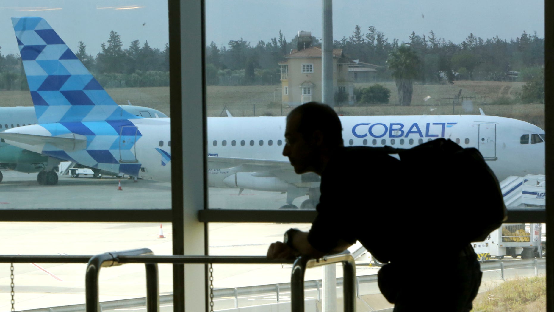 Cyprus-based airline Cobalt Air says it has indefinitely suspended all of its operations, Thursday, amid a struggle to find investors. (AP Photo/Petros Karadjias)