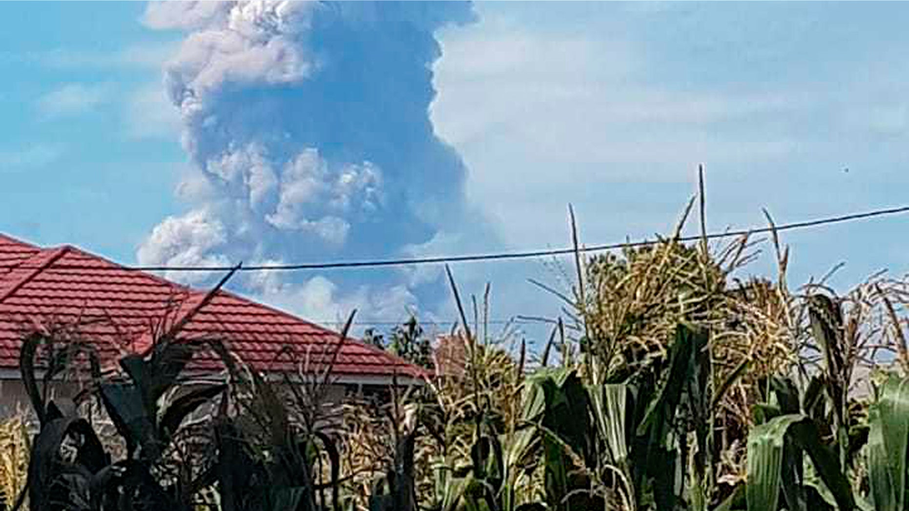 Volcano erupts on same Indonesian island as earlier quake.