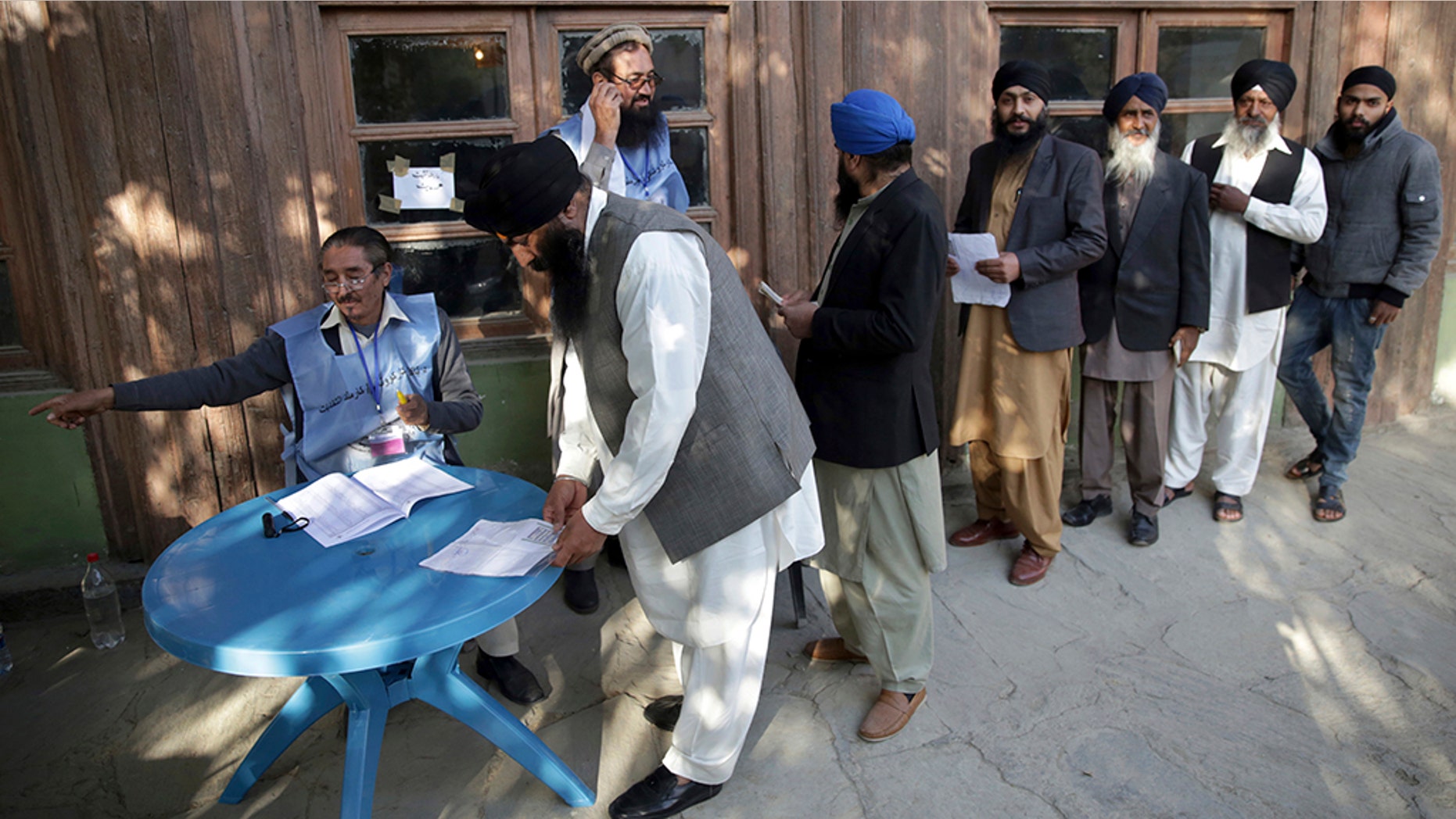 Voters defy violence and suicide bombers for Afghan parliamentary elections; 15 dead in Kabul Voters defy violence and suicide bombers for Afghan parliamentary elections; 15 dead in Kabul