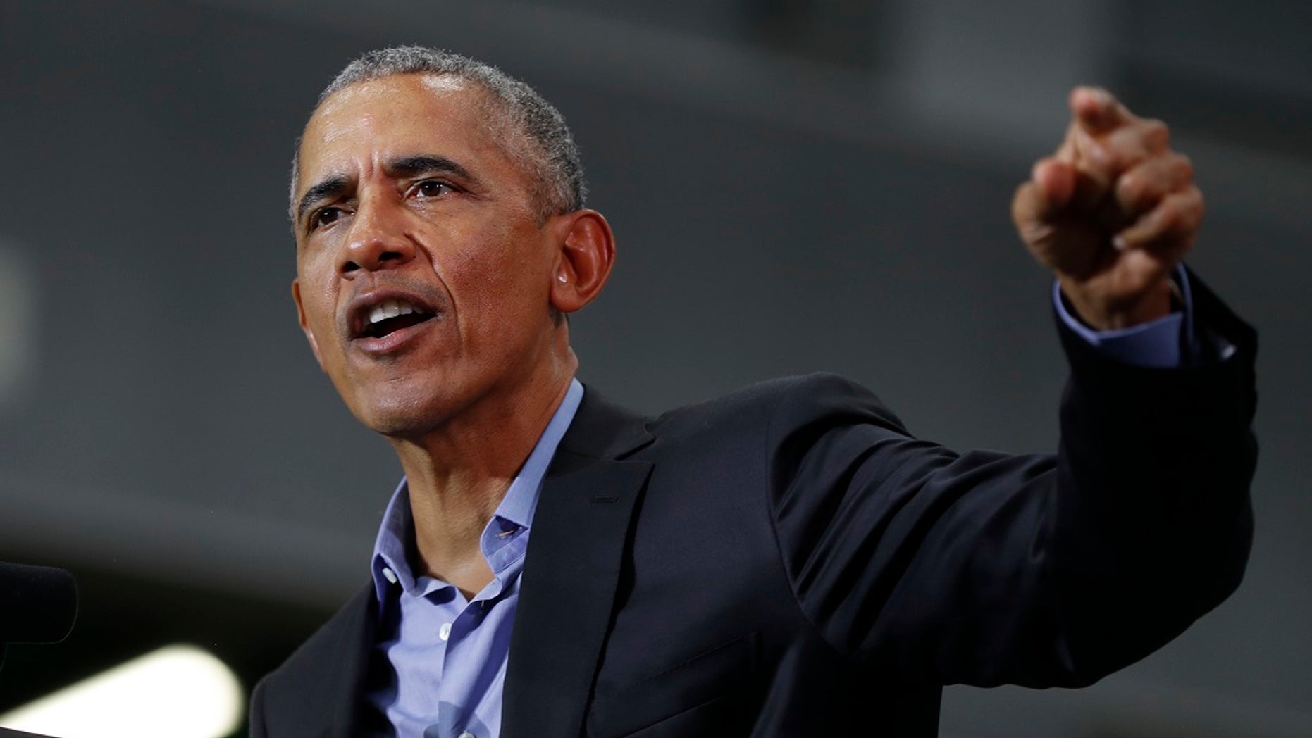 Former President Barack Obama speaks during a rally in Detroit on Friday.
