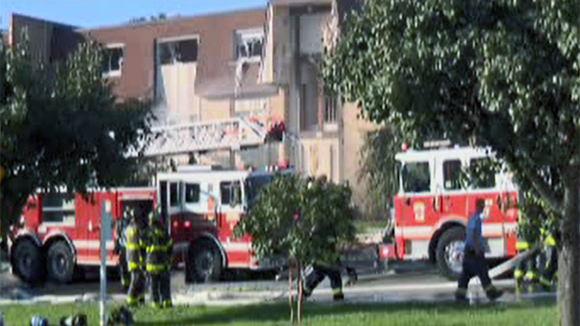 Firefighters respond to a gas explosion in Baltimore Wednesday.