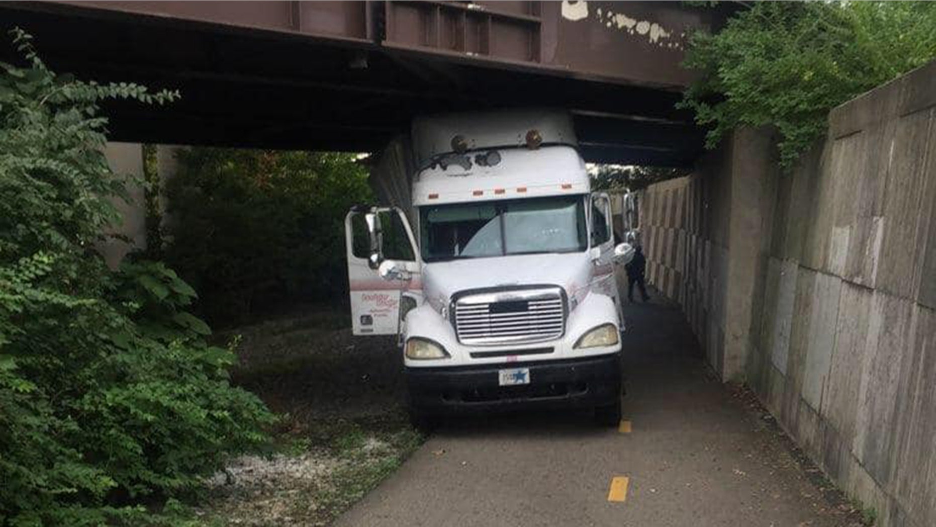 A truck driver was cited after hitting several bridges in Ohio on Thursday morning, police said.