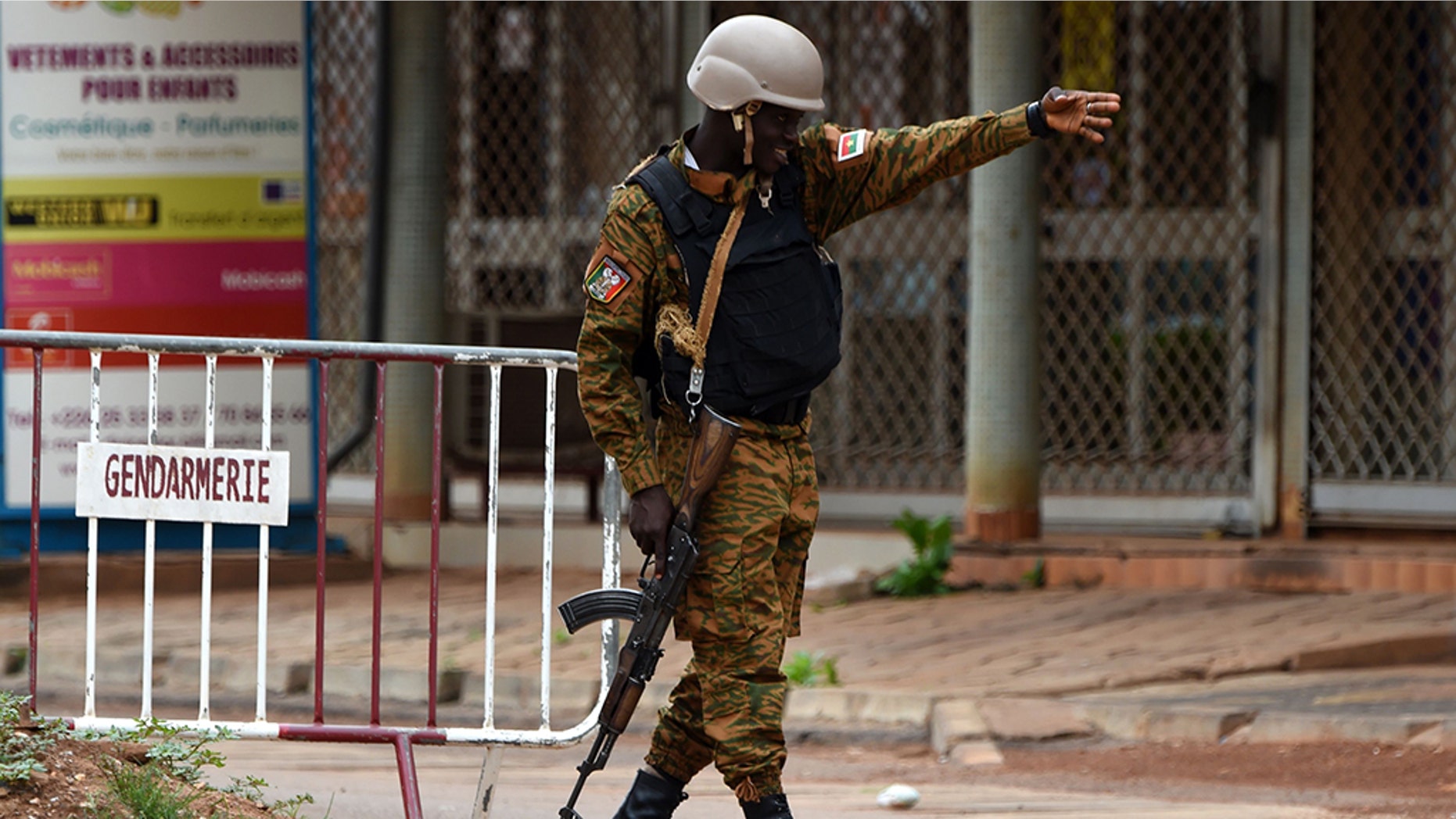 A security official gestures as he stands at a barrier close to the site of a terrorist attack in Ouagadougou on August 15, 2017. (KAMBOU/AFP/Getty Images)