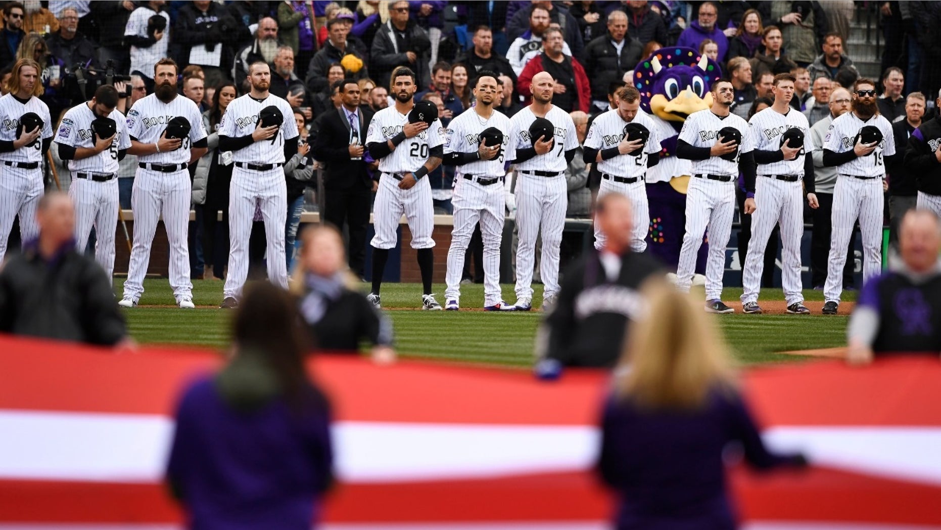 The Colorado Rockies seen here lining up before the national anthem.