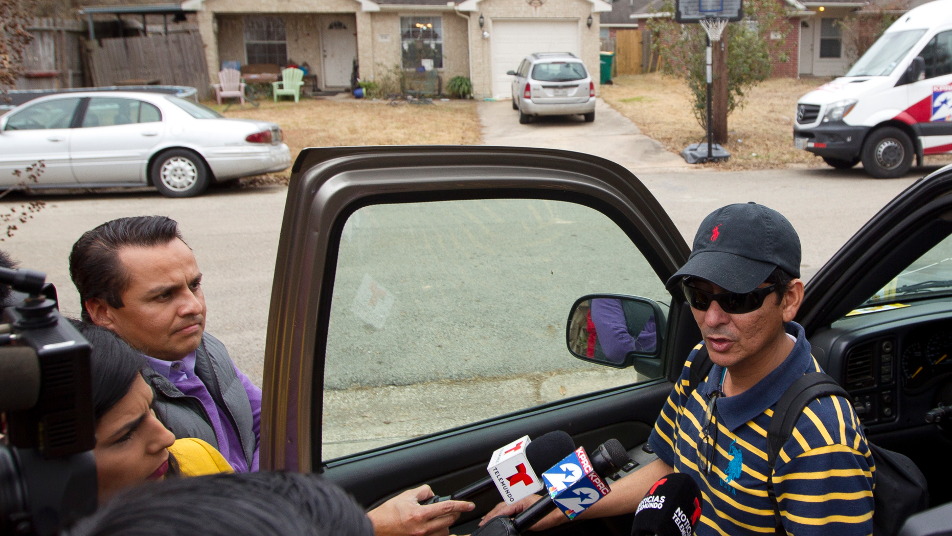 CHANGES NAME TO VALLADARES - Ernesto Valladares, brother of Ulises Valladares, speaks to the media Friday, Oct. 26, 2018 across from his brother's home where Ulises and his son were bound by a pair of men on Wednesday. The father was taken away by the kidnappers and later killed during an FBI raid Thursday morning. (Jason Fochtman/Houston Chronicle via AP, File)