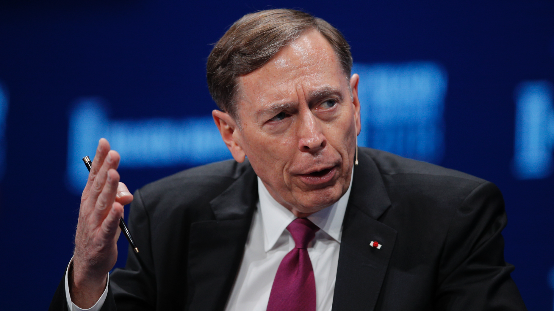 FILE - In this Monday, April 30, 2018 file photo, former CIA director retired Gen. David Petraeus speaks during a discussion at the Milken Institute Global Conference in Beverly Hills, Calif. Writing Friday Oct. 19, 2018 in the Times of London, the former commander of American forces in Iraq and Afghanistan said the United States' military cooperation with the U.K. could be threatened by the growing use of human rights laws to target British soldiers. (AP Photo/Jae C. Hong, File)