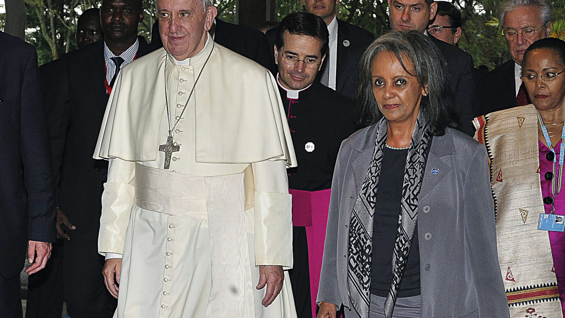 FILE - In this Thursday, Nov. 26, 2015 file photo, Pope Francis walks next to then Director-General of the United Nations Office at Nairobi (UNON) Sahle-Work Zewde, right, upon his arrival there in Nairobi, Kenya. Ethiopian lawmakers unanimously elected the seasoned diplomat Sahle-Work Zewde as the country's first female president, a largely ceremonial post, on Thursday, Oct. 25, 2018. (Simon Maina/Pool via AP, File)