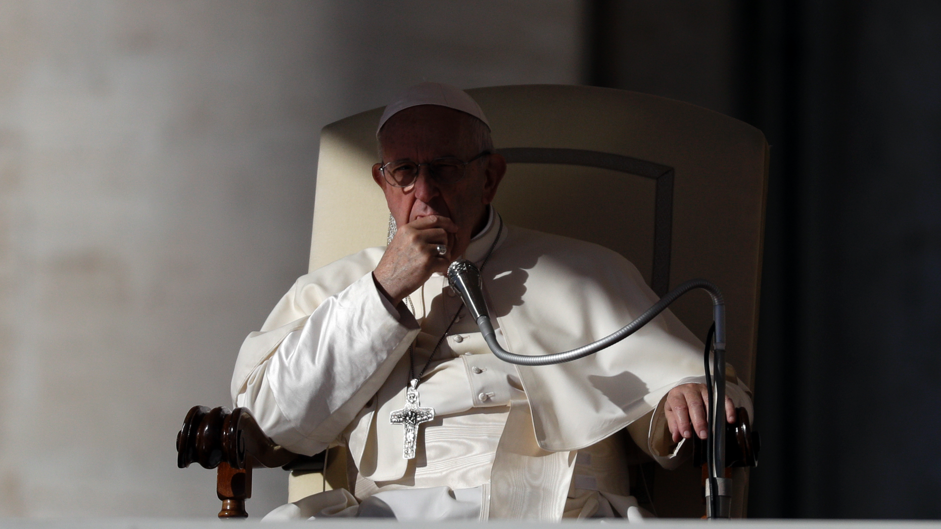 Pope Francis listens to the welcome speeches during his weekly general audience in St. Peter's Square at the Vatican, Wednesday, Oct. 24, 2018. (AP Photo/Gregorio Borgia)