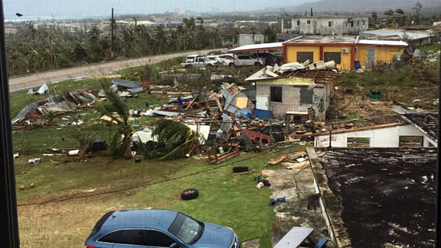 This Thursday, Oct. 25, 2018 photo taken by Amber Lee Alberts shows destruction on the island of Saipan, her home, after Super Typhoon Yutu swept through the Commonwealth of the Northern Mariana Islands earlier in the week. Gregorio Kilili Camacho Sablan, the commonwealth's delegate to U.S. Congress, said the territory will need significant help to recover from the storm, which he said injured several people. (Amber Lee Alberts via AP)
