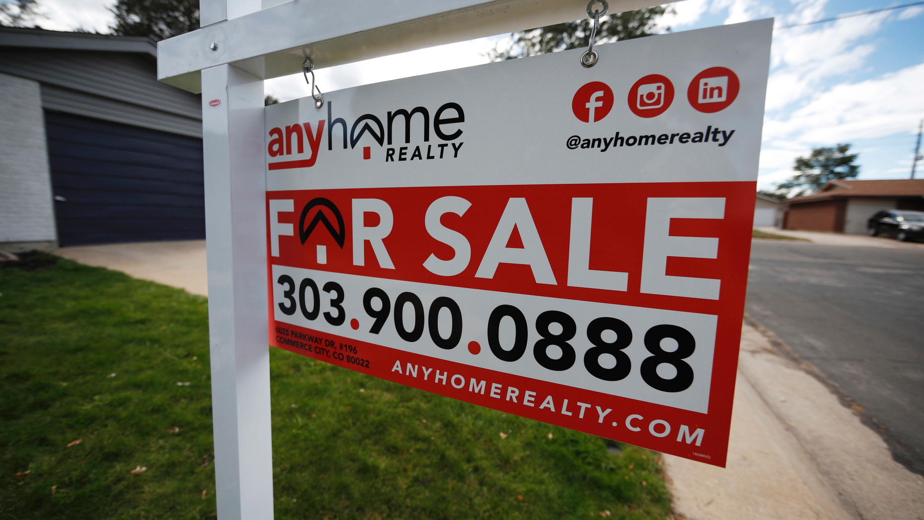 FILE- In this Oct 2, 2018, photo a for sale sign stands outside a home on the market in the north Denver suburb of Thornton, Colo. On Tuesday, Oct. 30, the Standard & Poor's/Case-Shiller 20-city home price index for August is released. (AP Photo/David Zalubowski, File)