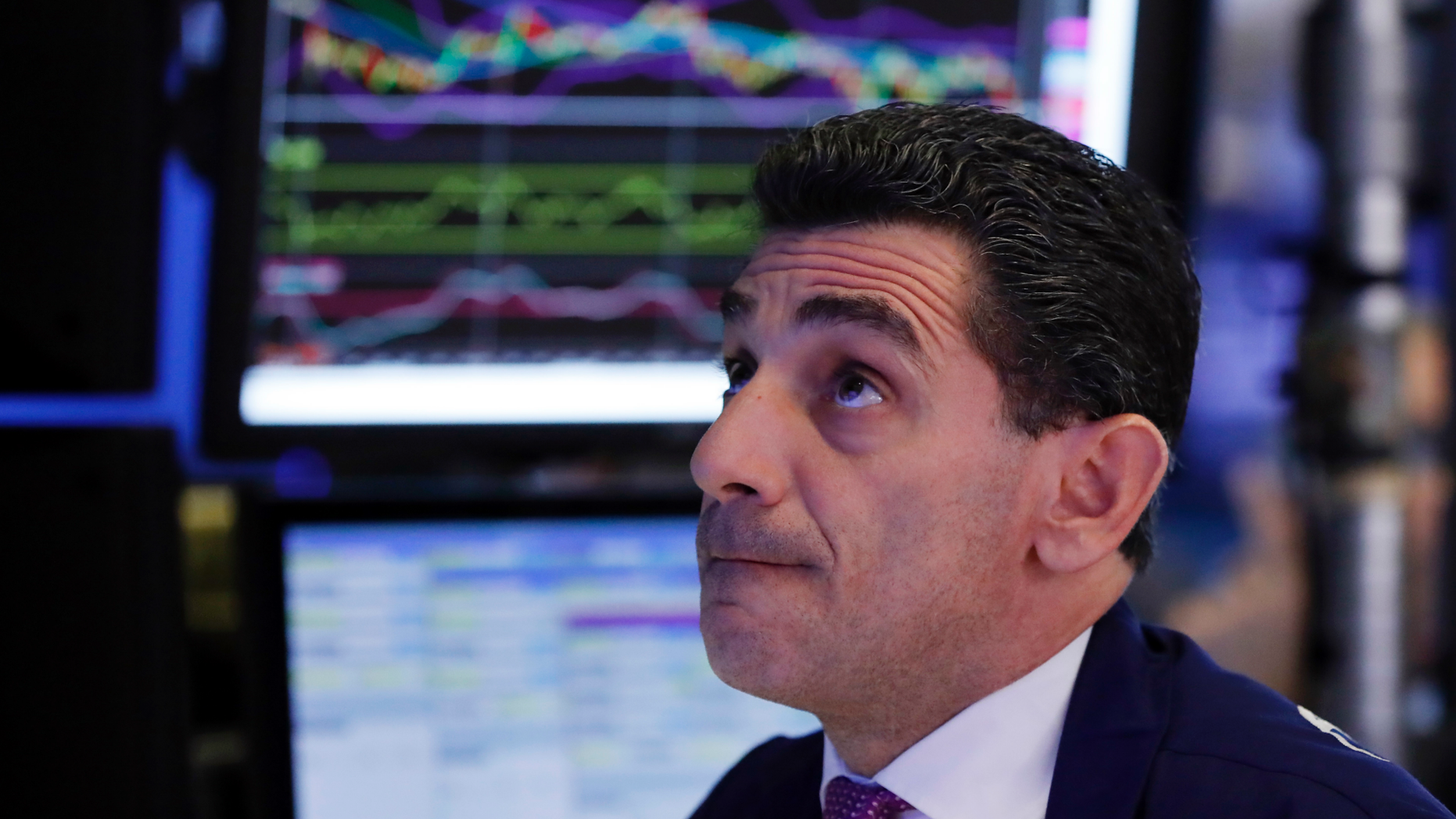 Specialist Peter Mazza works on the floor of the New York Stock Exchange, Thursday, Oct. 11, 2018. Stocks are slumping for a second straight day as the market endures its most volatile stretch since February. (AP Photo/Richard Drew)