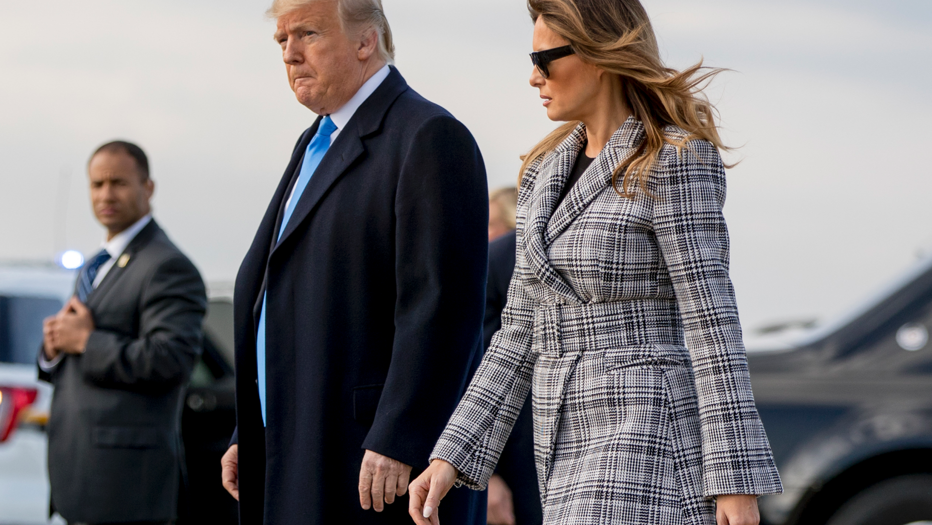 President Donald Trump and first lady Melania Trump arrive at Pittsburgh International Airport in Coraopolis, Pa., Tuesday, Oct. 30, 2018, following last weekends shooting at Tree of Life Synagogue in Pittsburgh. (AP Photo/Andrew Harnik)