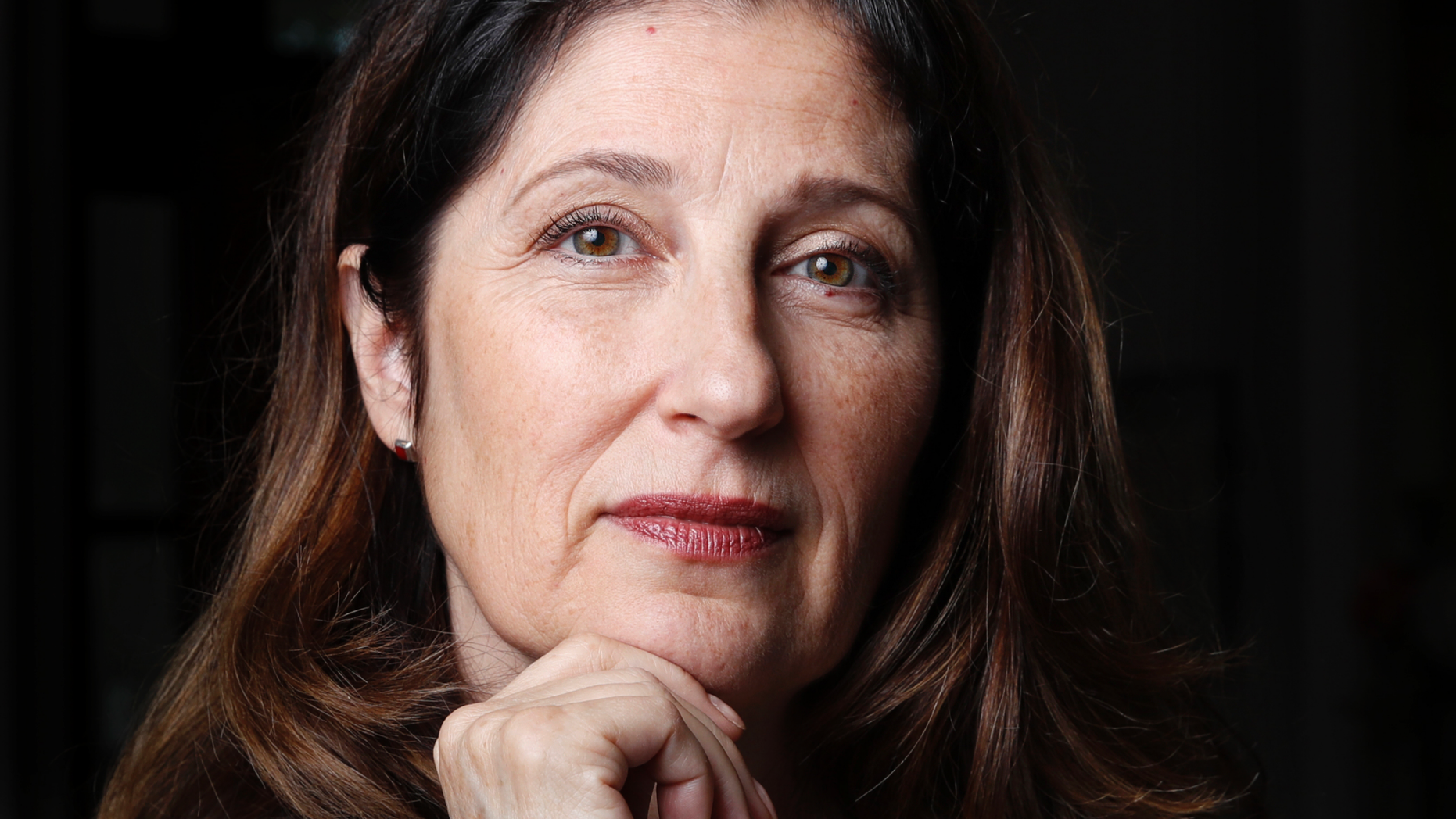 Ruth D-Eredita, poses for a portrait in her home in Vienna, Va., Friday, Oct. 5, 2018. D-Eredita graduated from Mount Holyoke College in 1984 and last October reported that a professor sexually assaulted her when she was a sophomore in college. Universities have seen an increase in decades-old sexual misconduct complaints amid the MeToo movement. (AP Photo/Jacquelyn Martin)