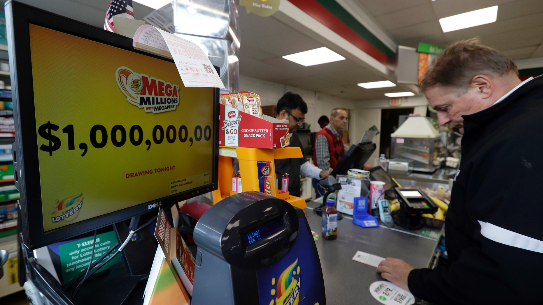 A sign displays the estimated Mega Millions jackpot at a convenience store in Chicago, Friday, Oct. 19, 2018. Friday's jackpot has soared to $1 billion, the second-largest prize in U. S. lottery history. (AP Photo/Nam Y. Huh)