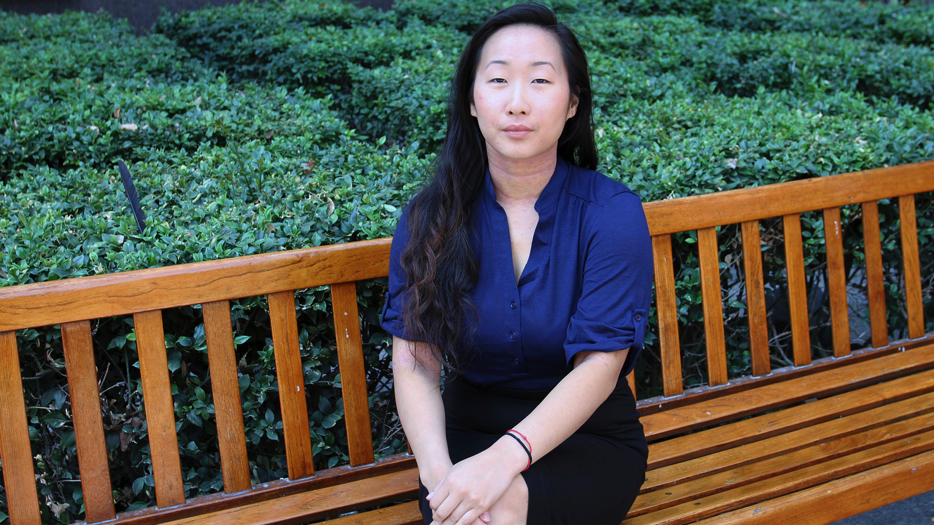 FILE - In this Aug. 12, 2016, file photo, Yee Xiong sits for a photo in Sacramento, Calif. A jury has awarded more than $150,000 in damages to the California woman whose 2012 campus assault case drew wide attention. Now 26 years old, Xiong calls the verdict a 'huge win' for survivors around the world and shows that people can be held accountable, not matter how long it takes. (AP Photo/Darcy Costello, File)
