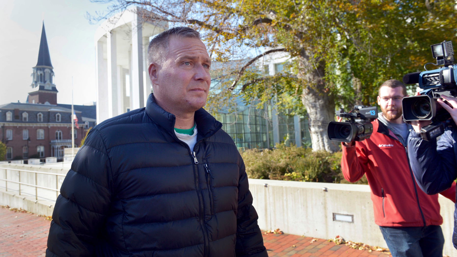 Former Springfield police detective Steven Vigneault leaves the Springfield federal courthouse Wednesday, Oct. 31, 2018 in Springfield, Mass. Springfield police Officer Gregg Bigda and former detective Steven Vignault, two police officers used excessive force while arresting two Latino teenagers, and one of the officers said "welcome to the white man's world," according to a federal indictment unsealed in Massachusetts.(Don Treeger/The Republican via AP)