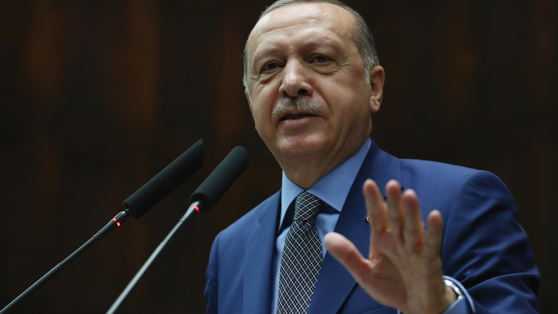 Turkey's President Recep Tayyip Erdogan addresses supporters at the parliament, in Ankara, Tuesday, Oct. 30, 2018. Erdogan said the Turkish prosecutor repeated to his Saudi counterpart Turkey's extradition request of 18 suspects detained in Saudi Arabia for the Oct. 2 killing to be put on trial in Istanbul. (Presidential Press Service via AP, Pool)
