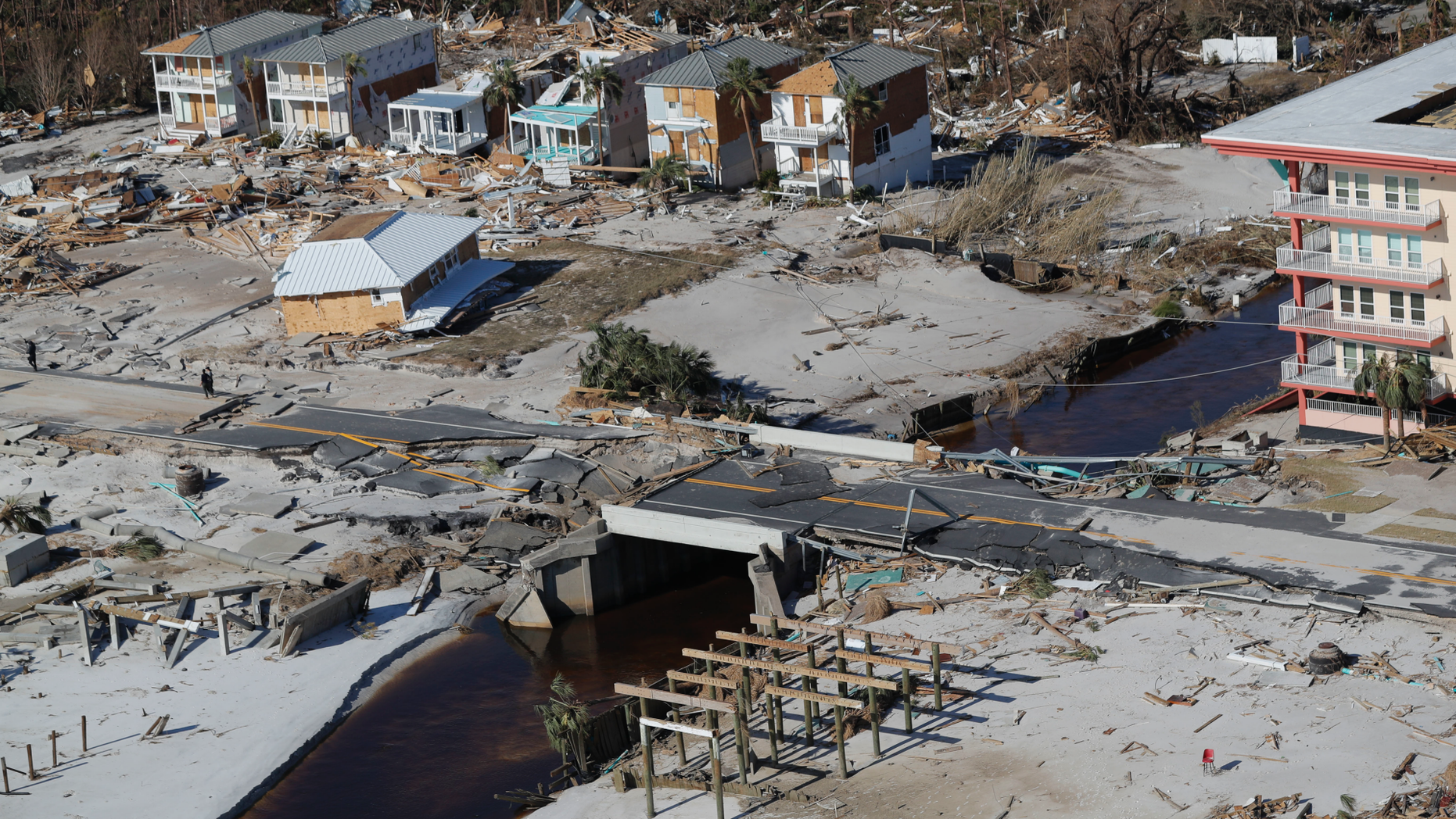This photo shows devastation from Hurricane Michael in this aerial photo over Mexico Beach, Fla., Friday, Oct. 12, 2018. Blocks and blocks of homes were demolished, reduced to piles of splintered lumber or mere concrete slabs, by the most powerful hurricane to hit the continental U.S. in nearly 50 years. (AP Photo/Gerald Herbert)