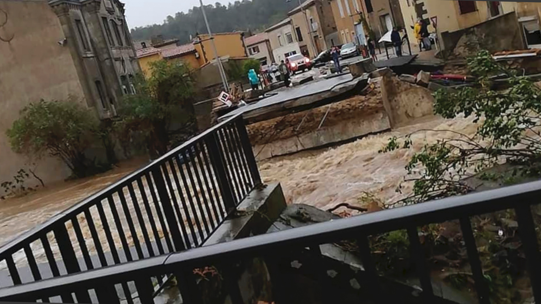 Flash floods have left several people dead in southwest France, with roads swept away and streams become raging torrents as the equivalent of several months of rain fell overnight, authorities said Monday. (AP Photo/Stephane Jourdain)