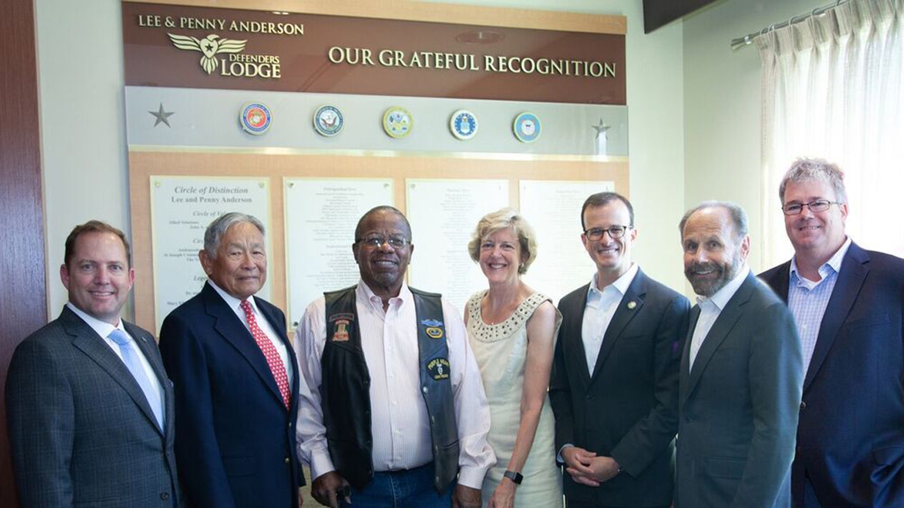 James Schenck, President and CEO of PenFed Credit Union; Honorable Frederick F.Y. Pang, Chairman of the PenFed Foundation, Billy Bryels, Veteran; Lisa Freeman, former Director/CEO, VA Palo Alto Health Care System; Assembly Member Marc Berman (24th District); State Senator Jerry Hill (13th District); William Ball, Chief, Voluntary &amp; Hospital Services, VA Palo Alto Health Care System at the Lee &amp; Penny Anderson Defenders Lodge.