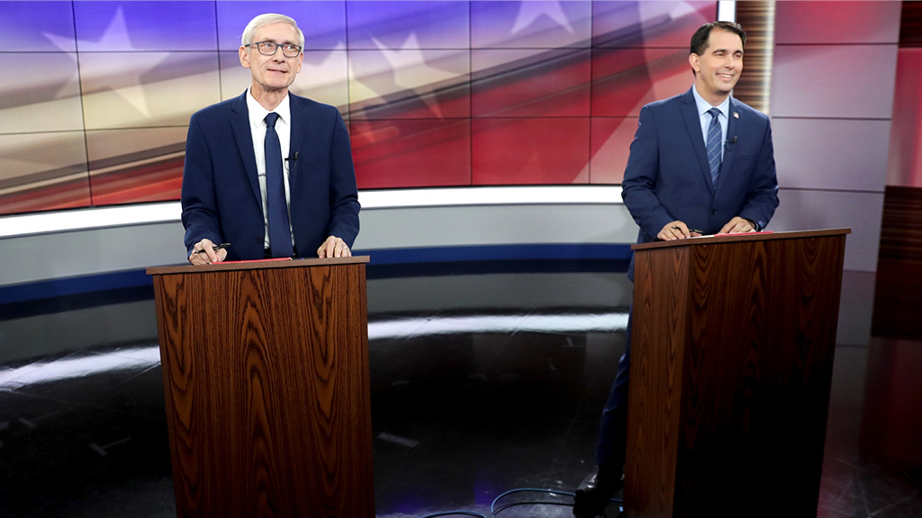 Democratic challenger Tony Evers (L) and Wisconsin Gov. Scott Walker (R). (Steve Apps/Wisconsin State Journal/Pool via REUTERS)