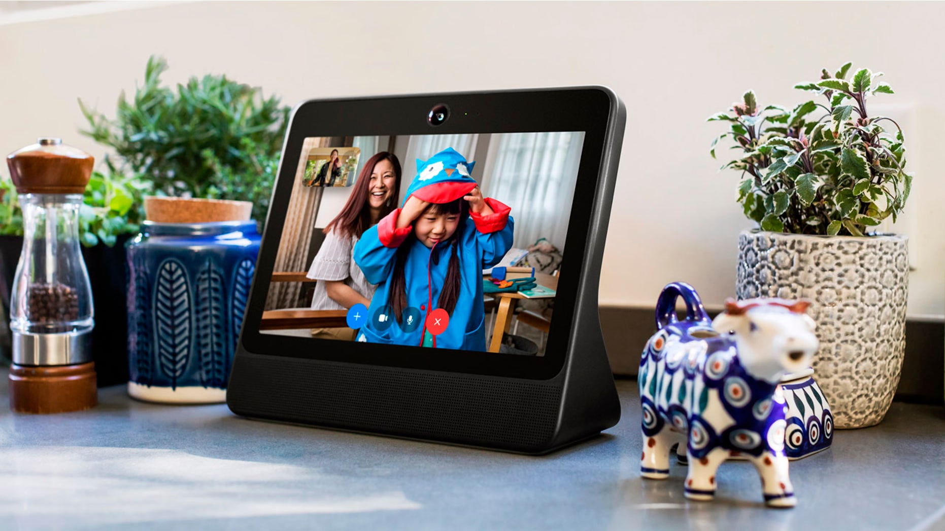 This image provided by Facebook shows the company's product called Portal. Facebook is marketing the device Portal, as a way for its more than 2 billion users to chat with one another without having to fuss with positioning and other controls. (Facebook via AP)