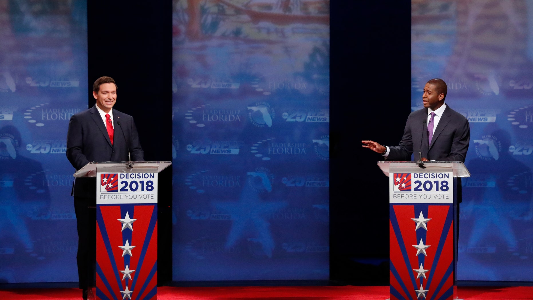 Florida gubernatorial candidates, Republican Ron DeSantis, left, and Democrat Andrew Gillum debate, Wednesday, Oct. 24, 2018, at Broward College in Davie, Fla. (AP Photo/Wilfredo Lee, Pool)