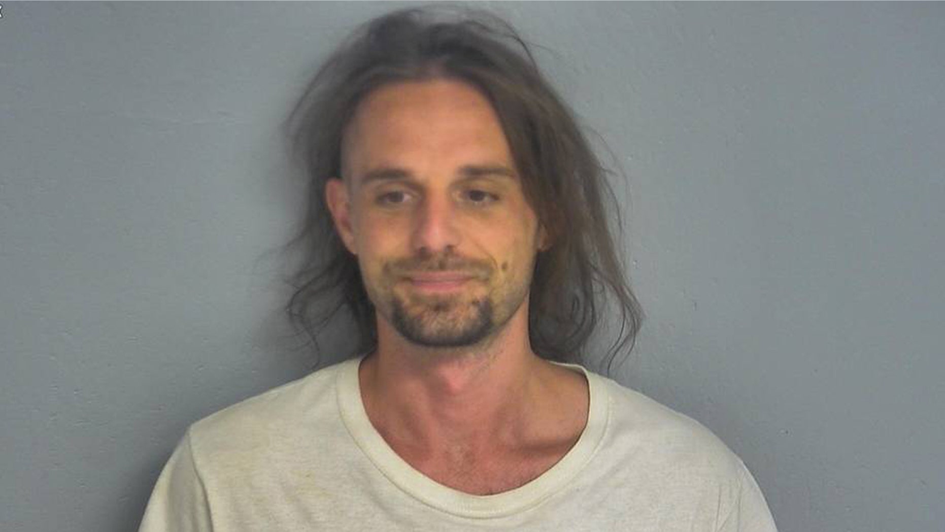 Dustin Burns, 33, is charged with a felony after recording a video of himself removing his ankle monitor, officials said.