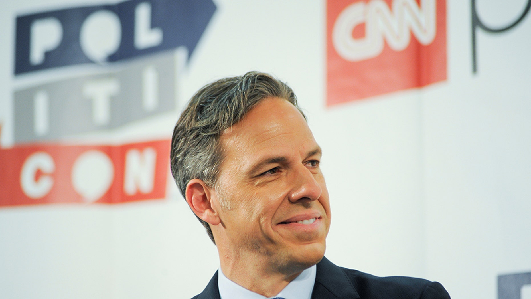 CNN's anchor, Jake Tapper, is under fire for keeping quiet when a guest said Trump had radicalized more people than ISIS. (REUTERS / Andrew Cullen, File)