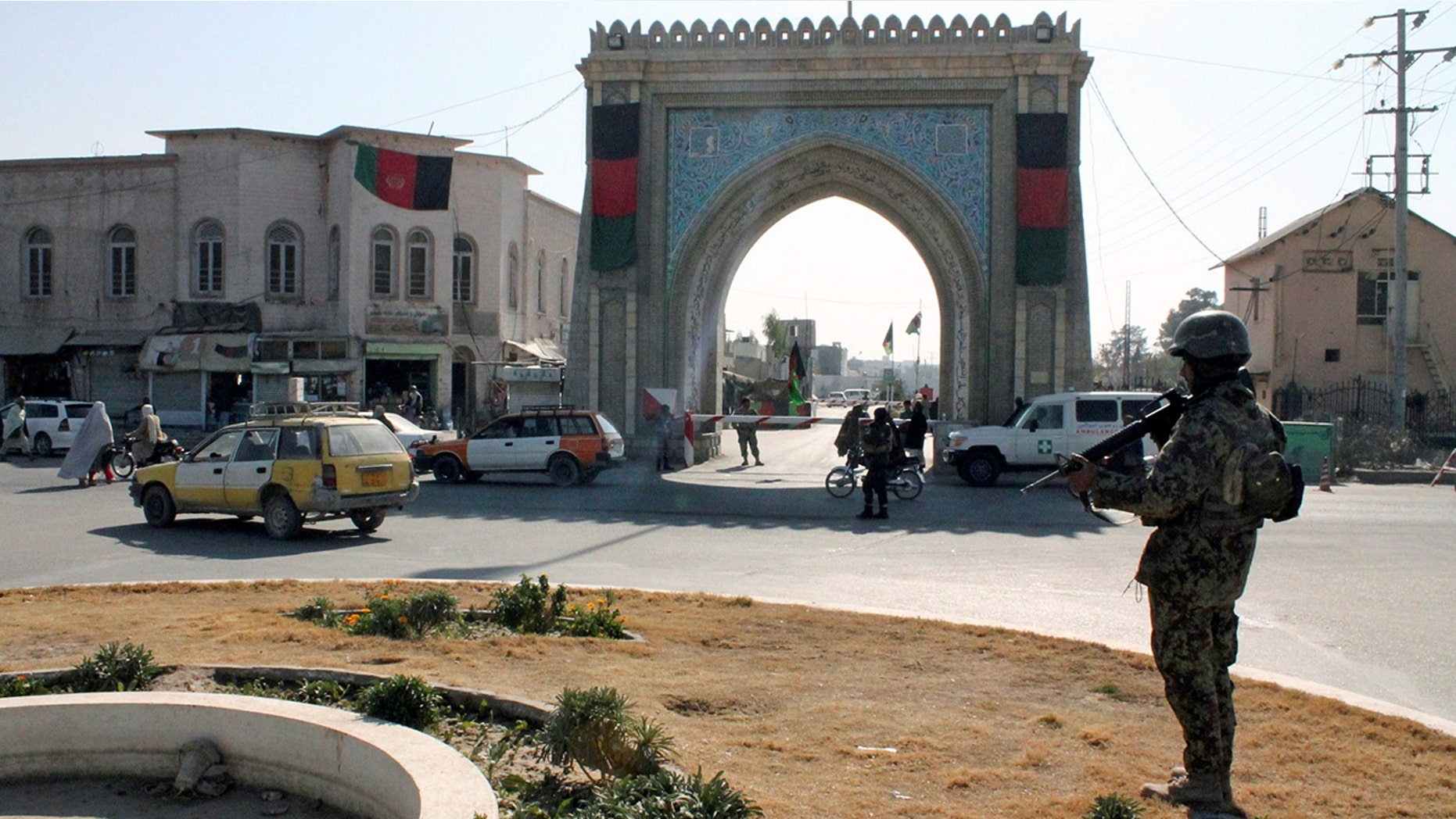 Two Americans were wounded in a shooting outside the governor's mansion in the southern Afghanistan province of Kandahar.