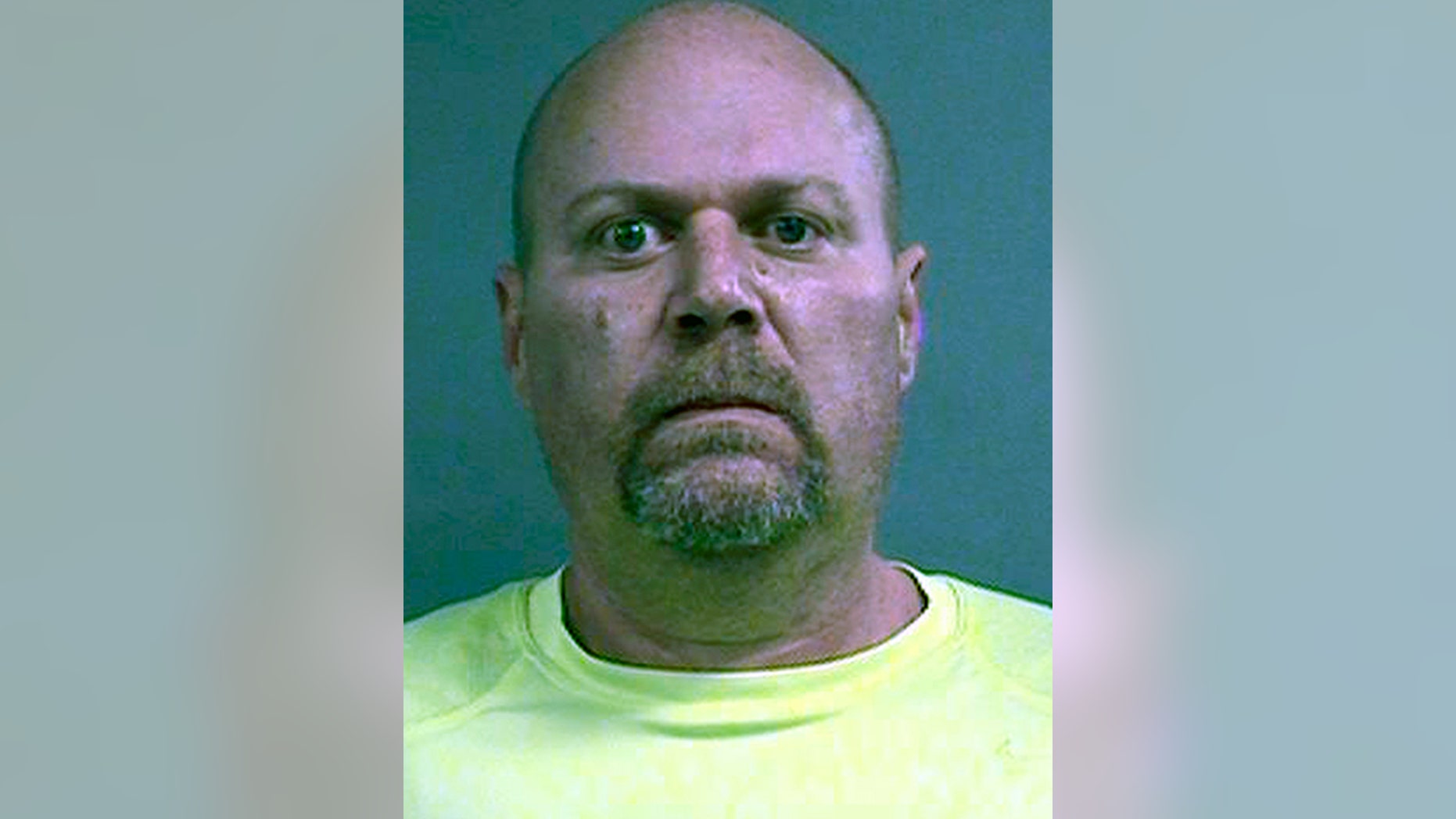 This photo provided by Louisville Metro Department of Corrections shows Gregory Alan Bush, who was booked early Thursday, Oct. 25, 2018, on two counts of murder and 10 counts of felony wanton endangerment, according to Louisville Metro Detention Center records. (Louisville Metro Department of Corrections via AP)