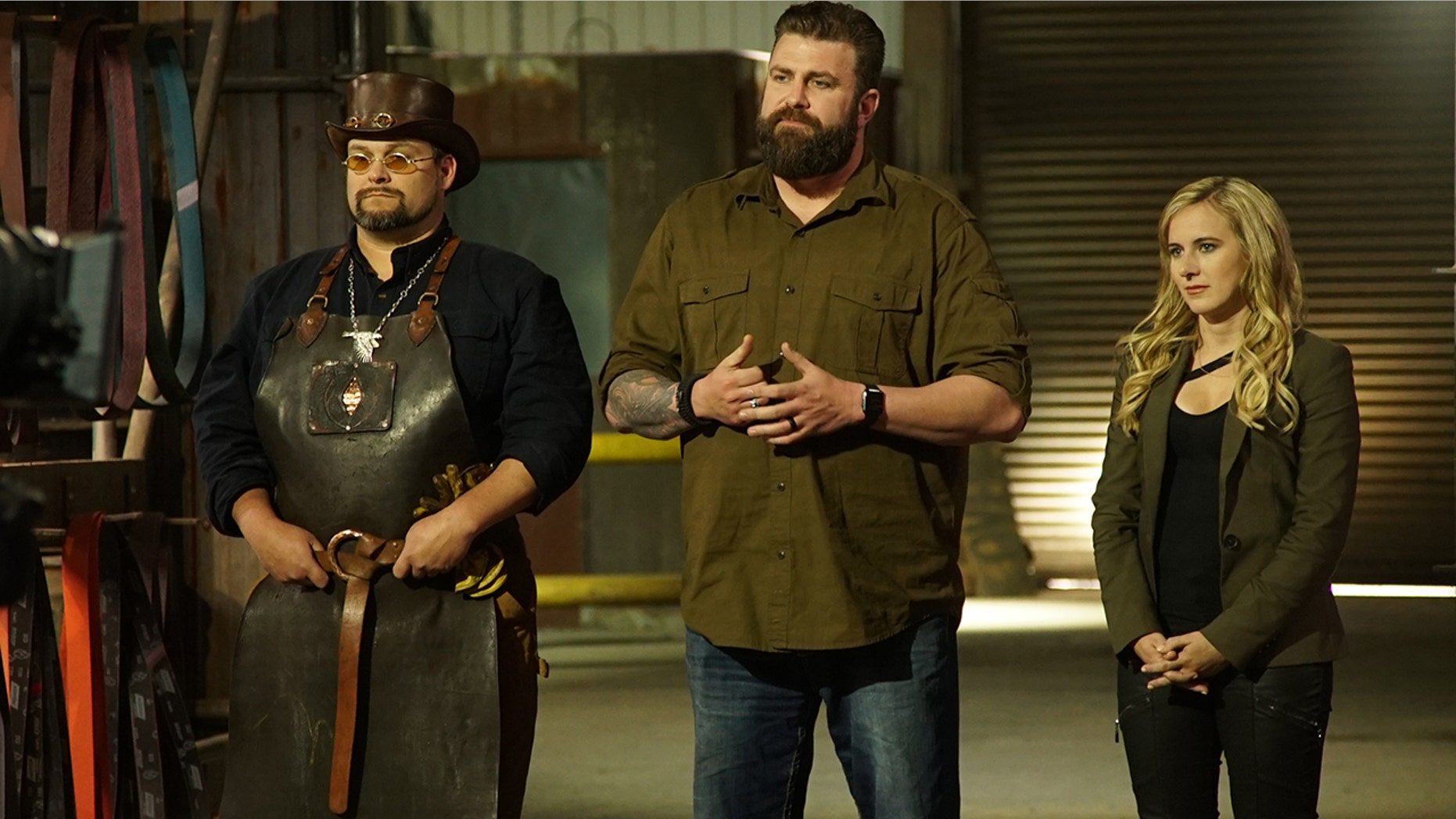 Trent, Zeke and Ashley address contestants on Discovery's "Master of Arms.'