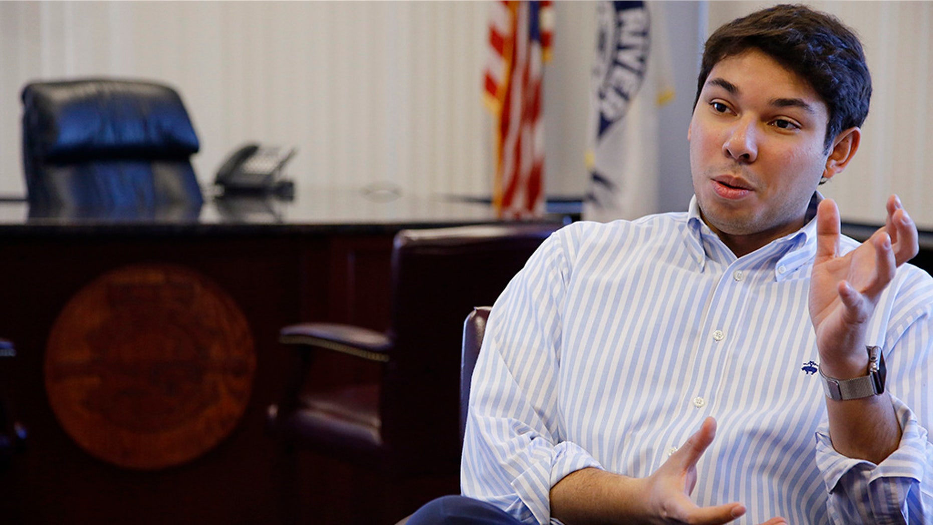 In this Jan. 6, 2016, file photo, newly elected Mayor Jasiel Correia talks in his city hall office in Fall River, Massachusetts.