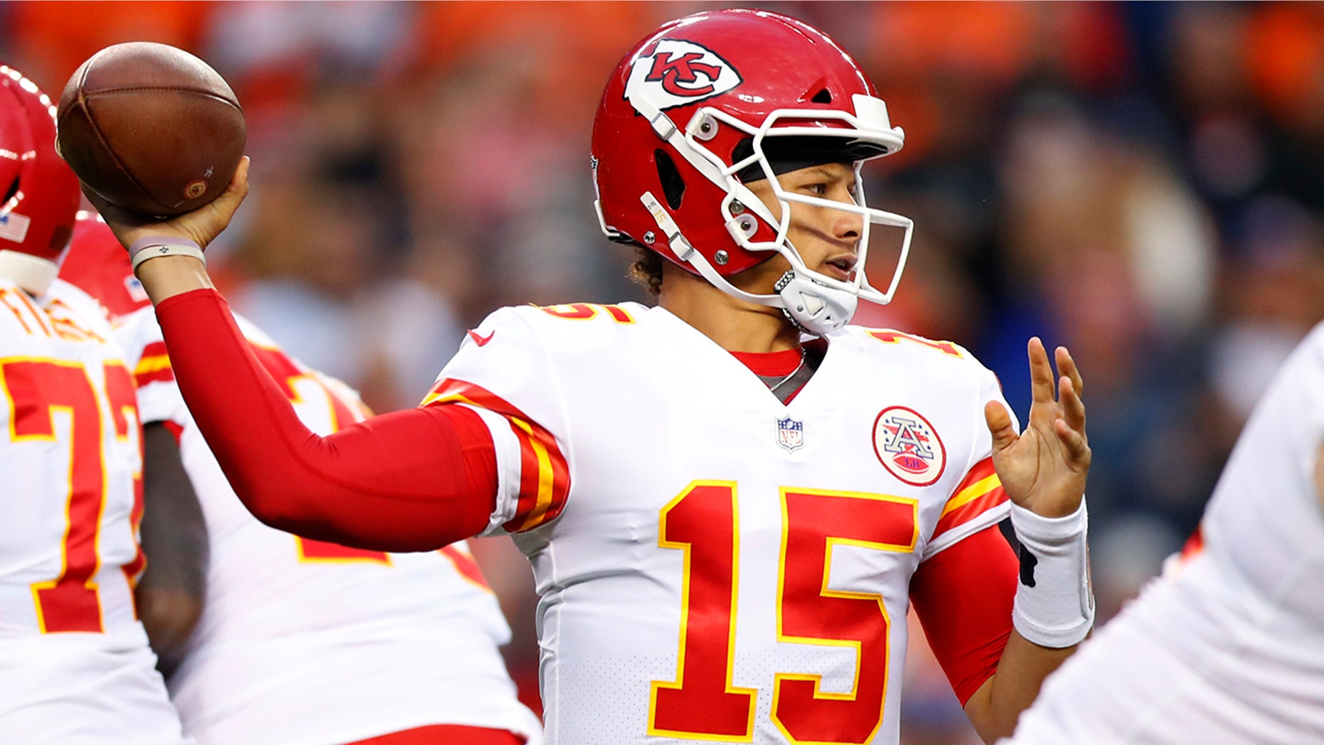 Kansas City Chiefs quarterback Patrick Mahomes throws a pass during the first half of an NFL football game against the Denver Broncos