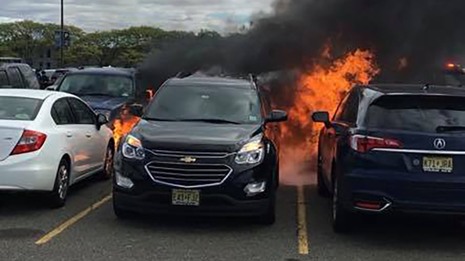 At least seven cars caught fire during the New York Jets game on Sunday.