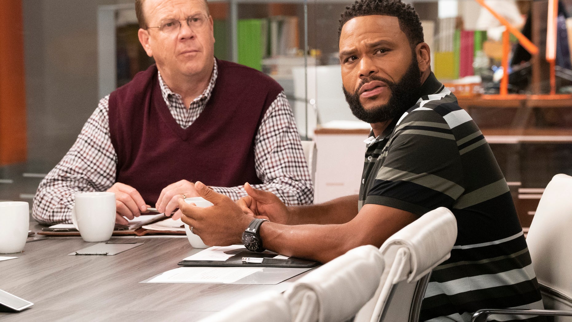 Peter Mackenzie, left, discusses his character's consistently oblivious racial remarks on ABC’s “black-ish.”